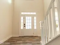 211 Cheswick Drive, Holly Ridge, NC 28445 — 3-bedroom home in The Preserve At Morris Landing, Holly Ridge, NC, photo 11 of 65: Entry door