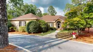 28 Devon Drive, Pinehurst, NC 28374 — 3-bedroom home in Pinewild CC, Pinehurst, NC, photo 1 of 70: 28-Devon-Drive-08122026_215150