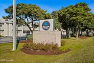 602 W Fort Macon Road 233, Atlantic Beach, NC 28512 — 1-bedroom waterfront condo in Palm Suites, Atlantic Beach, NC, photo 1 of 33: 1-print-148PalmSuites-Nov22-2025-001