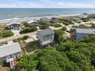 1410 Ocean Drive, Emerald Isle, NC 28594 — 3-bedroom waterfront home in Emerald Isle By The Sea, Emerald Isle, NC, photo 8 of 49: 8-print-DJI_20260622162949_0167_D