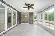 8983 Mango Bay Court NE, Leland, NC 28451 — 4-bedroom townhome in Compass Pointe, Leland, NC, photo 20 of 53: Sunroom