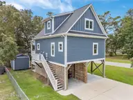 681 Forest Drive SE, Bolivia, NC 28422 — 2-bedroom waterfront home in Sunset Harbor, Bolivia, NC, photo 4 of 32: exterior