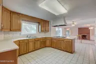 112 Coastal Bluffs Court, Hampstead, NC 28443 — 4-bedroom waterfront home in Olde Point, Hampstead, NC, photo 16 of 37: Kitchen