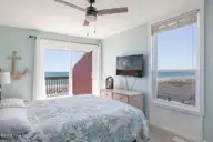 1509 Ocean Drive West, Emerald Isle, NC 28594 — 4-bedroom waterfront townhome in Emerald Isle By The Sea, Emerald Isle, NC, photo 9 of 26: 2 Seas the Day West 026 2nd level king