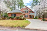 793 Daphne Lane, Vass, NC 28394 — 4-bedroom waterfront home in Woodlake, Vass, NC, photo 1 of 59: 793 Daphne Lane