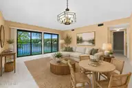 250 Sugar Gum Lane # 214, Pinehurst, NC 28374 — 2-bedroom waterfront condo in Lakeview Condos, Pinehurst, NC, photo 20 of 58: Living staged