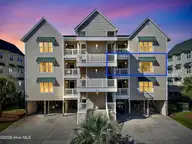 123 Via Old Sound Boulevard #C, Ocean Isle Beach, NC 28469 — 4-bedroom waterfront condo in Islander Resort, Ocean Isle Beach, NC, photo 1 of 72: 123 Via Old Sound Blvd. #C