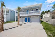 1516 Pinfish Lane, Carolina Beach, NC 28428 — 4-bedroom waterfront home in Wilmington Beach, Carolina Beach, NC, photo 1 of 79: 4_front exterior