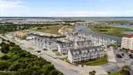 200 Olde Towne Yacht Club Drive 49, Beaufort, NC 28516 — 3-bedroom waterfront townhome in Inlet Cove Townhomes, Beaufort, NC, photo 2 of 54: 1-web-or-mls-DJI_20250729164906_0957_D
