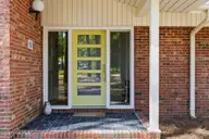 228 Heather Lane, Southern Pines, NC 28387 — 3-bedroom home in Highland Trails, Southern Pines, NC, photo 5 of 43: Front Entrance