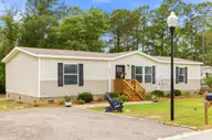 2667 Mill Pond Court SE, Bolivia, NC 28422 — 3-bedroom manufactured home in Cypress Lakes, Bolivia, NC, photo 2 of 36