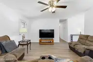 4580 Squirrel Avenue NW, Shallotte, NC 28470 — 3-bedroom home in Wildwood Village, Shallotte, NC, photo 10 of 30: LVP Flooring Throughout