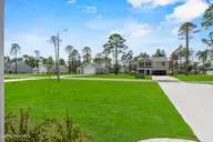 960 Parkway Road, Southport, NC 28461 — 3-bedroom home in The Highlands at Boiling Spring Lakes, Southport, NC, photo 2 of 22: Autumn Front View