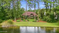 908 Sawgrass Court, New Bern, NC 28560 — 3-bedroom waterfront home in Fairfield Harbour, New Bern, NC, photo 3 of 51: On the Pond