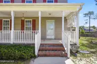 141 Crystal Road, Southport, NC 28461 — 3-bedroom home, Southport, NC, photo 2 of 40: 141 Crystal Rd front porch
