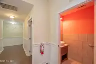 111 Graham Lane, Beaufort, NC 28516 — 6-bedroom home in Graham Subdivision, Beaufort, NC, photo 24 of 53: Hall with Half Bath