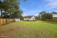 2405 Harness Court, Greenville, NC 27858 — 3-bedroom home in Tucker East, Greenville, NC, photo 12 of 44: Rear View 1