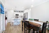 135 NE 75th Street, Oak Island, NC 28465 — 4-bedroom home in Tranquil Harbor, Oak Island, NC, photo 5 of 37: Dining Room