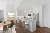 805 Mulberry Street 206, Beaufort, NC 28516 — 2-bedroom condo in 805 Mulberry, Beaufort, NC, photo 2 of 22: Kitchen, Dining & Living
