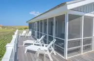 9 Sandspur Trail, Bald Head Island, NC 28461 — 4-bedroom waterfront home in Stage I, Bald Head Island, NC, photo 6 of 9: 9 SANDSPUR OUTDOOR DECK RESIZED