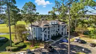 330 S Middleton Drive NW Unit 104, Calabash, NC 28467 — 2-bedroom waterfront condo in Brunswick Plantation, Calabash, NC, photo 7 of 40: 3-web-or-mls-DJI_20250901100528_0039_D