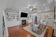 302 Palisades Way, New Bern, NC 28560 — 3-bedroom home in Lynnwood Highlands, New Bern, NC, photo 8 of 41: Built in bookshelves