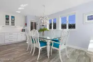 301 Salter Path Road 12 Genesis, Pine Knoll Shores, NC 28512 — 3-bedroom waterfront condo in Genesis, Pine Knoll Shores, NC, photo 18 of 48: Dining Room