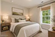 5256 Soybean Drive NE, Winnabow, NC 28479 — 3-bedroom home in Country Walk, Winnabow, NC, photo 9 of 43: Serene Sage and Linen Bedroom