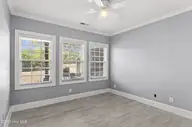 100 Lindy Court, Hampstead, NC 28443 — 4-bedroom waterfront home in Bent Tree, Hampstead, NC, photo 13 of 52: Bedroom