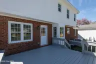 2403 Harness Court, Greenville, NC 27858 — 3-bedroom home in Tucker East, Greenville, NC, photo 18 of 64: Deck off great room