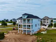 102 Marshland Circle, Newport, NC 28570 — 4-bedroom waterfront home in Cannonsgate, Newport, NC, photo 5 of 19: Rear Elevation