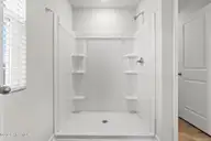 1063 Hanson Drive, Leland, NC 28451 — 3-bedroom home in East Lake, Leland, NC, photo 18 of 34: Primary Walk-in Shower