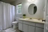 100 Sawmill Road E, Pinehurst, NC 28374 — 3-bedroom home in Village Acres, Pinehurst, NC, photo 13 of 25: primary bath
