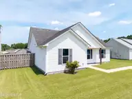 143 Sutton Drive, Elizabeth City, NC 27909 — 3-bedroom home in Carolina Village, Elizabeth City, NC, photo 3 of 18: 143 Sutton Drive Front of Home 2