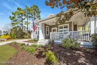 206 W Azalea Drive, Holly Ridge, NC 28445 — 3-bedroom home in Neighborhoods of Holly Ridge, Holly Ridge, NC, photo 3 of 23: Front of Porch