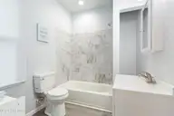 909 1st Street, Elizabeth City, NC 27909 — 3-bedroom home in Improvment Co of E.C., Elizabeth City, NC, photo 13 of 26: Downstairs full bath