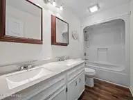 131 Oakleaf Drive, Pine Knoll Shores, NC 28512 — 3-bedroom waterfront home in Piksco, Pine Knoll Shores, NC, photo 10 of 35: Hallway bath