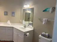 100 Lighthouse Lane C1, Cedar Point, NC 28584 — 2-bedroom condo in Village at Magens Bay, Cedar Point, NC, photo 12 of 19: Masterbath 2