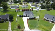 105 N Torhunta Drive, Goldsboro, NC 27534 — 3-bedroom home in Woodcroft, Goldsboro, NC, photo 5 of 50: DJI_0158