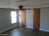 1934 Creswell Place SW, Supply, NC 28462 — 2-bedroom manufactured home in Styrons Landing, Supply, NC, photo 12 of 17: Master Bedroom 2