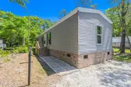 3440 Dolphin Drive, Bolivia, NC 28422 — 3-bedroom manufactured home in River Run Plantation, Bolivia, NC, photo 1 of 46: 3440 Dolphin-1