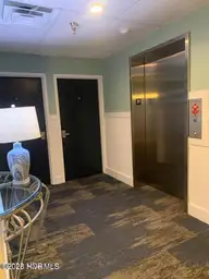 602 W Ft Macon Road 249, Atlantic Beach, NC 28512 — 1-bedroom waterfront condo in Palm Suites, Atlantic Beach, NC, photo 24 of 40: Palm Suites Hallway and Elevator