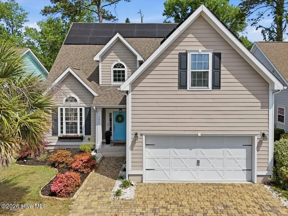 7824 Bonfire Drive, Wilmington, NC 28409 — 4-bedroom waterfront home in TidalWalk, Wilmington, NC, photo 1 of 73: 86-Final 7824_Bonfire_DrRJREM --2