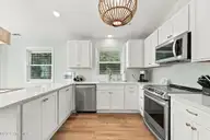 118 Periwinkle Drive, Emerald Isle, NC 28594 — 3-bedroom home in Shell Cove, Emerald Isle, NC, photo 11 of 39: 11 Kitchen