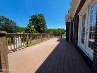 191 N Lakes Drive, Whiteville, NC 28472 — 5-bedroom waterfront home in North Lakes Estates, Whiteville, NC, photo 17 of 65: back deck off master