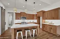 399 Summerhouse Drive, Holly Ridge, NC 28445 — 4-bedroom waterfront home in Summerhouse On Everett Bay, Holly Ridge, NC, photo 6 of 65: Look at the abundance of cabinets!