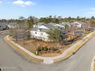 3810 River Front Place Unit 102, Wilmington, NC 28412 — 2-bedroom condo in Rivers Edge, Wilmington, NC, photo 22 of 22: 47-web-or-mls-DJI_20260213100225_0341_D