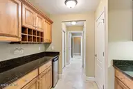 103 E Chelsea Court, Southern Pines, NC 28387 — 2-bedroom condo in Mid South Club, Southern Pines, NC, photo 17 of 54: Butler's Pantry