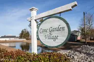 1828 Simonton Drive, Wilmington, NC 28405 — 3-bedroom home in Cane Garden Village, Wilmington, NC, photo 3 of 34: Cane Garden Village sign 1.2026L33A2190