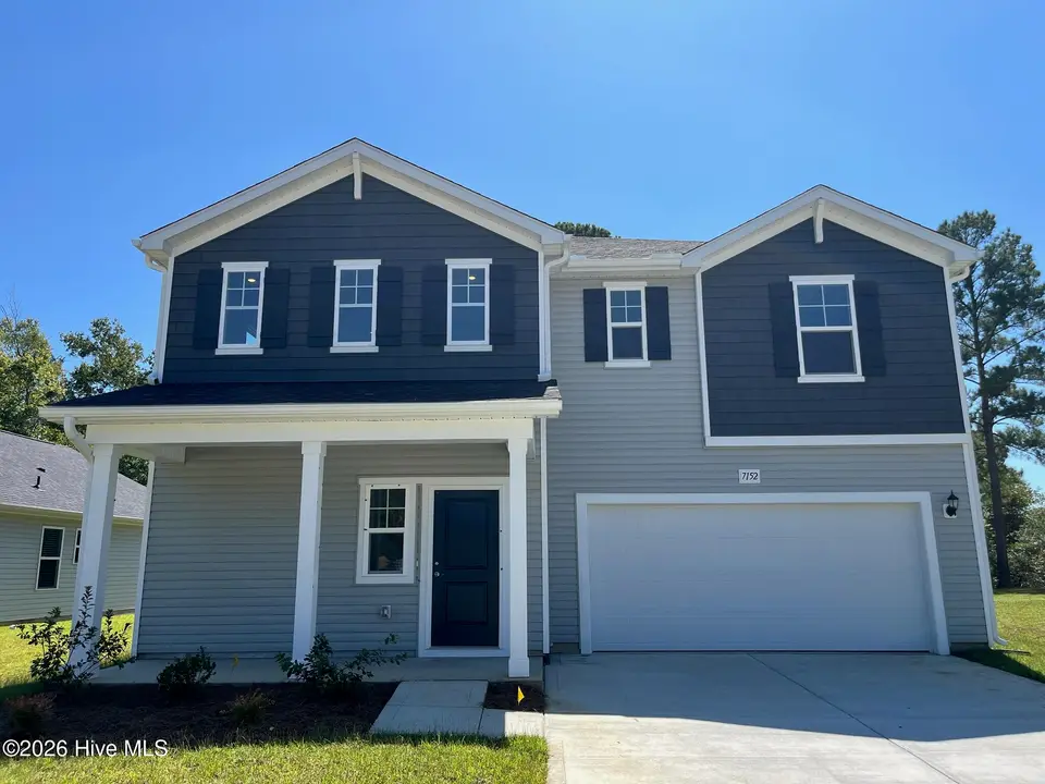 7152 Woodline Drive SW, Sunset Beach, NC 28468 — 4-bedroom home in Seaside Palms, Sunset Beach, NC, photo 1 of 3